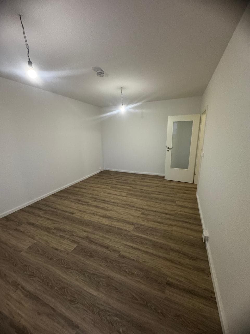 Wohnraum mit Vinylboden, bezugsfertig — Wohnräume, NRW · Deutschland · Trust NordBau